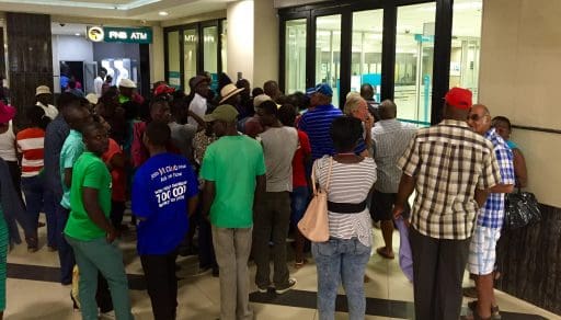 On the last day of the month, when many workers' monthly pay is automatically deposited into their accounts, there's a Black Friday-like line outside every bank and ATM to withdraw payday cash. This is at 9:55AM on April 30th.