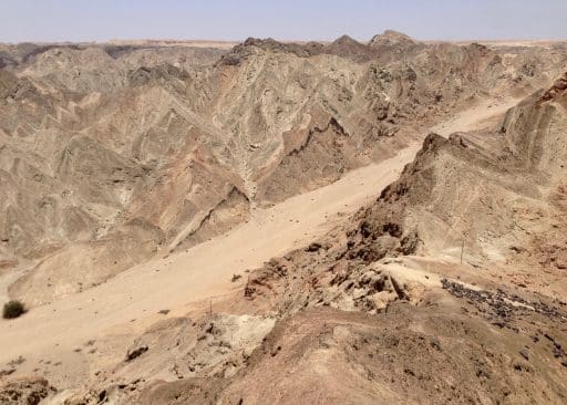 A side canyon with the high plains in the distance.